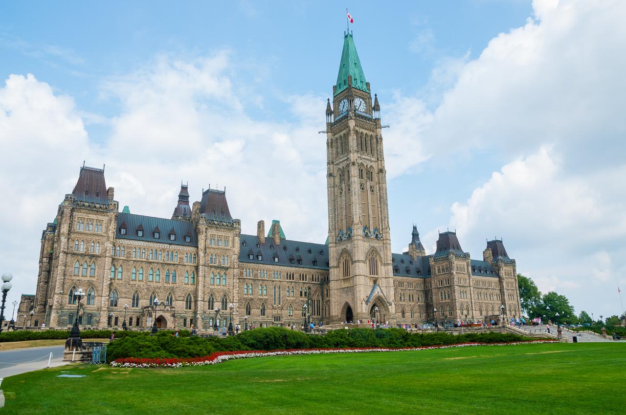 Canada Day celebrations in Ottawa with fireworks, flags, and large crowd